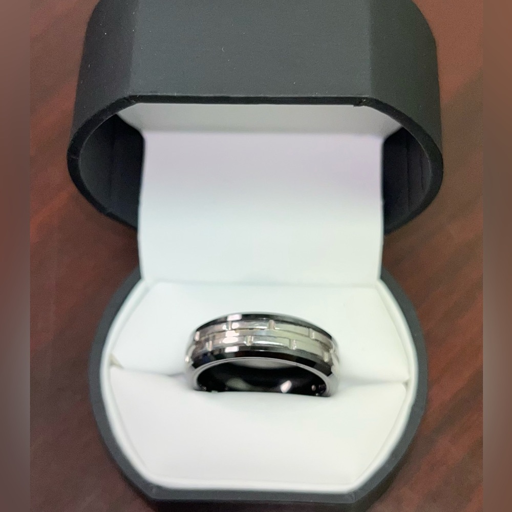 Men’s Wedding Band
Black & Silver Stainless Steel 
Size 12
In Original Box